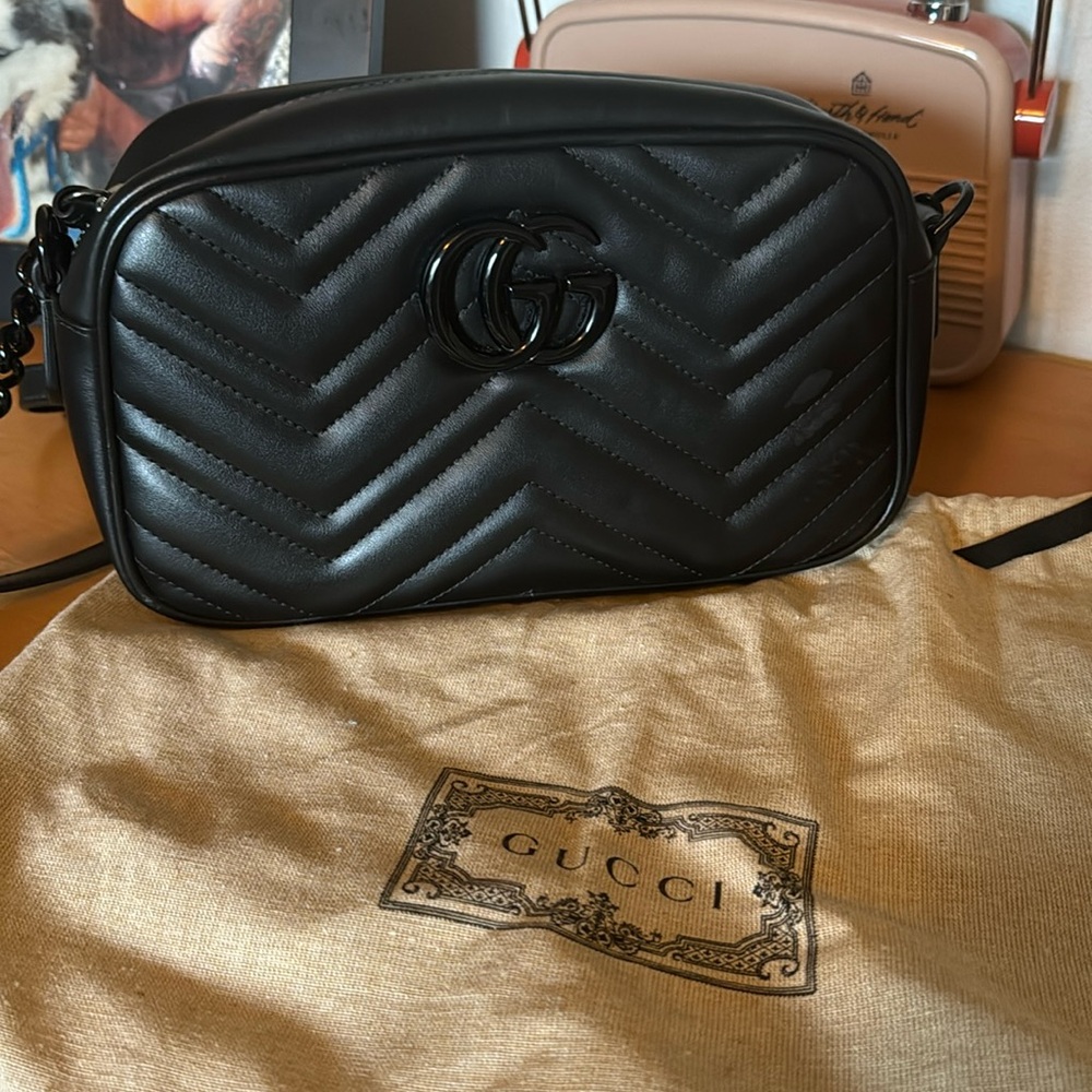 Authentic - used for a week. Comes with dustbag.